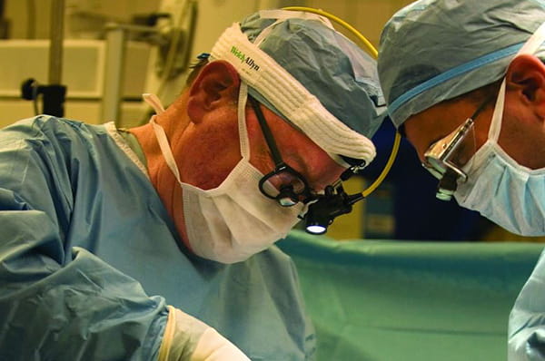 Henry Bohlman, MD, in the operating room