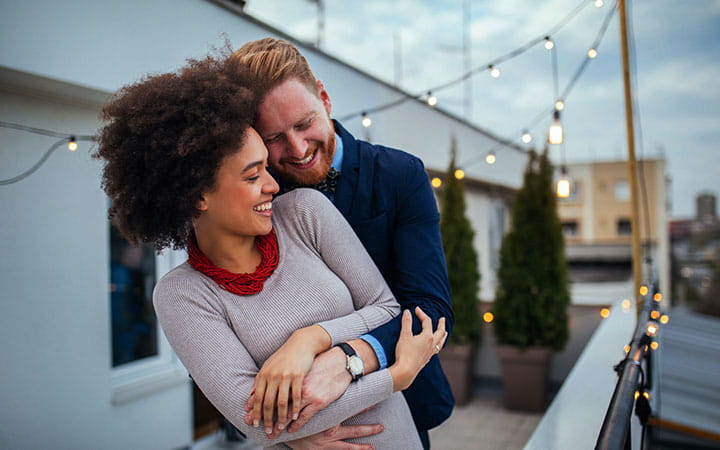 man hugging a woman