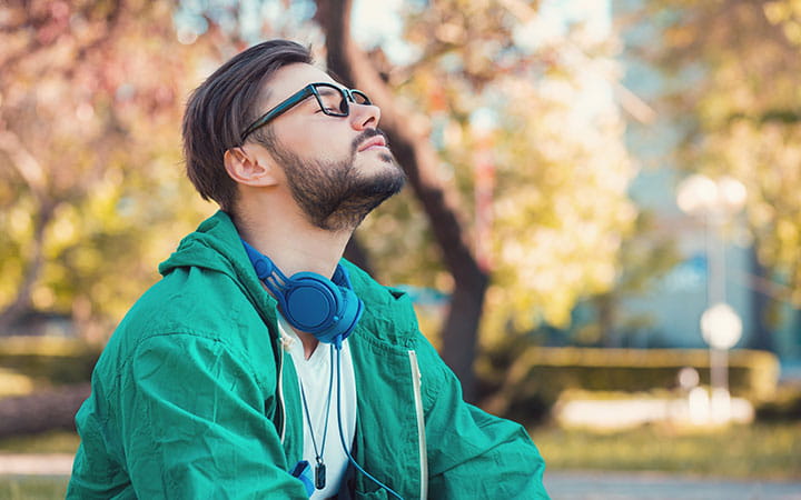 Man relaxing with headset