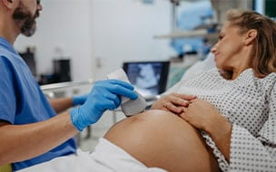pregnant woman getting ultrasound