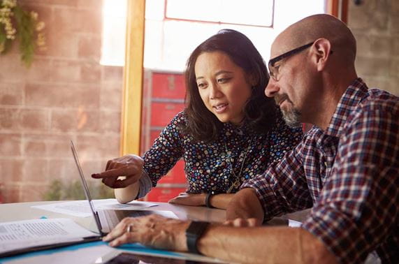 couple looking at tablet together