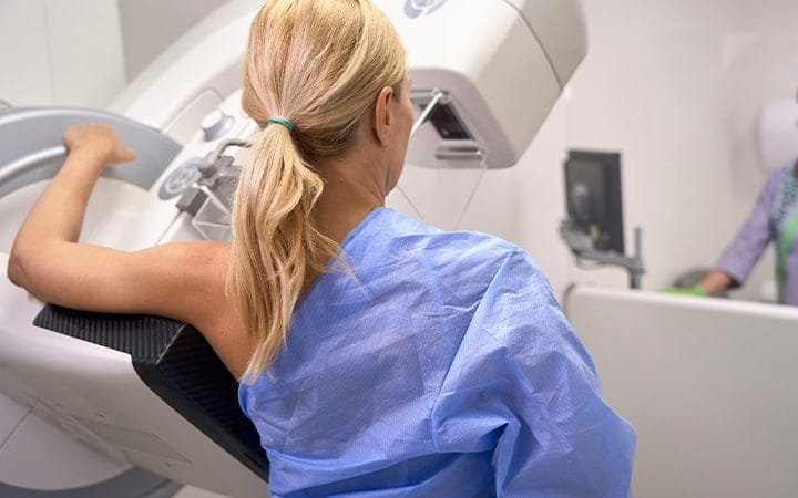 woman getting breast cancer screening