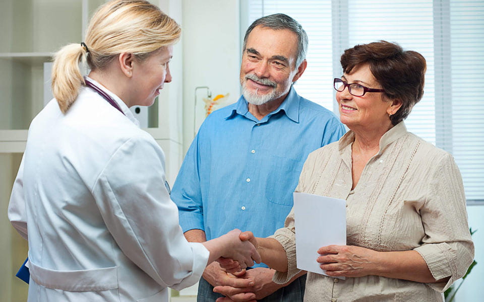 Senior couple visiting a doctor at the doctor's office
