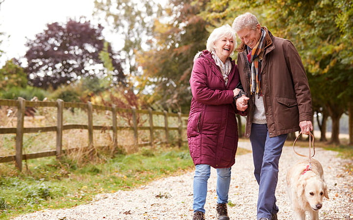 Older couple on autumn walk