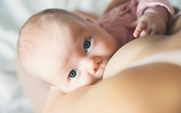 a baby breastfeeding