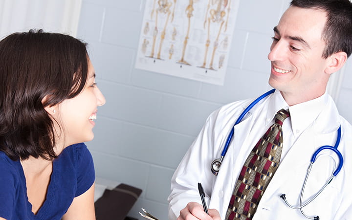 kid talking with doctor