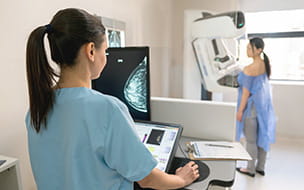 woman getting mammogram