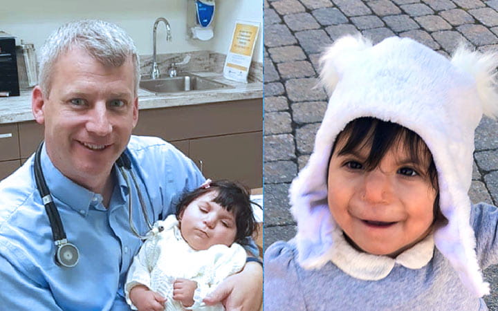 Dr. Strainic holds Nadine on the day they met, six months after she was born.