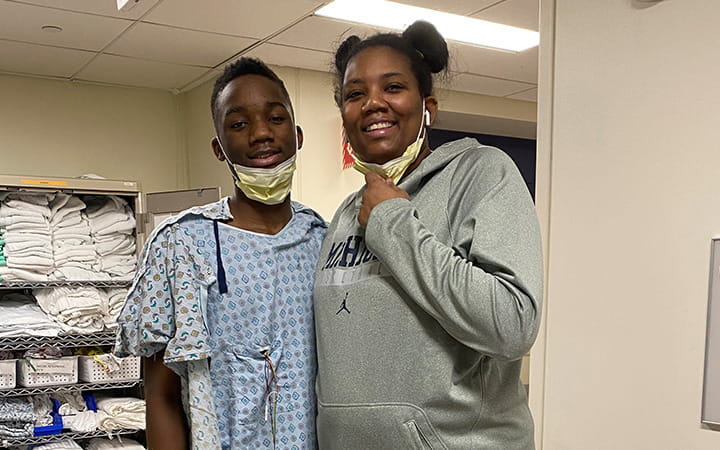 Z recovering after surgery with his mom NaSheema