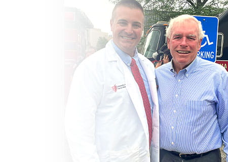 Dr. Christopher Dussel and Bill Regan