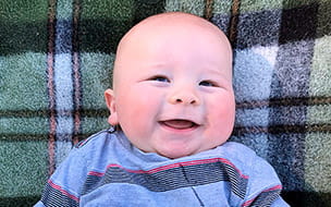 Emmett at eight months old, healthy and happy
