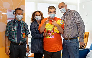 Cory and family with Jignesh Dalal, MD