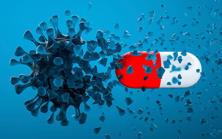 Illustration of a capsule killing the coronavirus