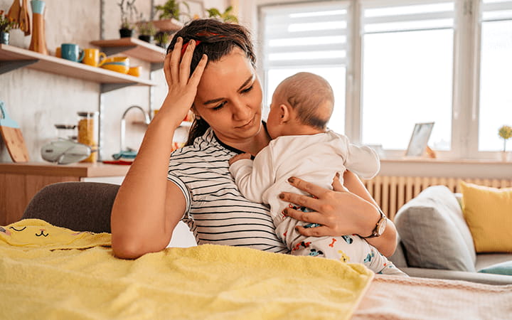 woman holding baby