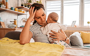 woman holding baby