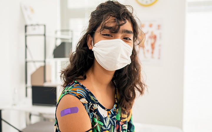 Teen girl after her vaccination