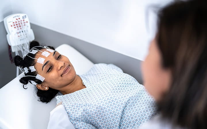 Woman in sleep laboratory