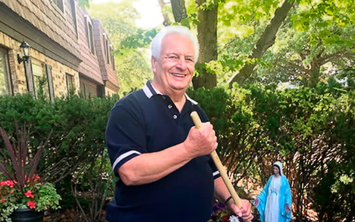Joe Timko in his garden on a sunny day