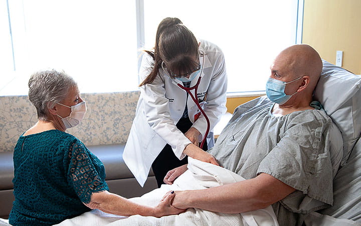 Molly Gallogly, MD, PhD examines Jack Boyle at University Hospitals Seidman Cancer Center