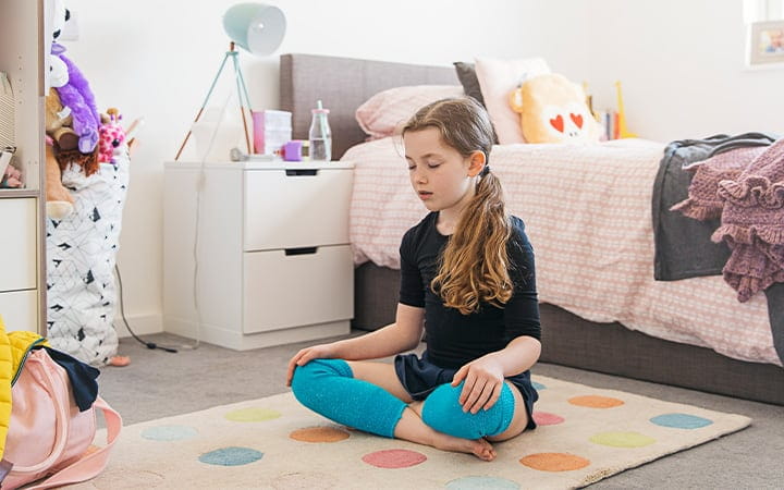 Young girl meditating