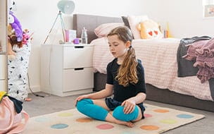 Young girl meditating