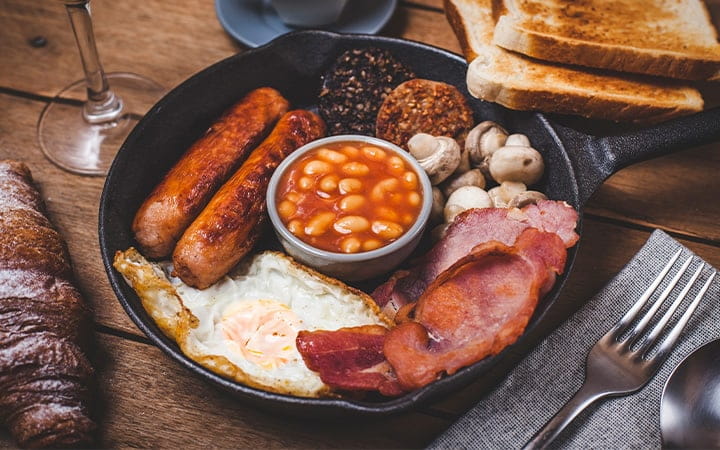 Plate with eggs, beans and meat