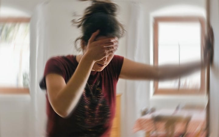 Woman feeling dizzy
