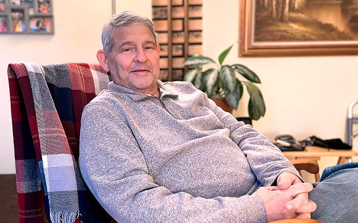 Jack Minior relaxes in a chair