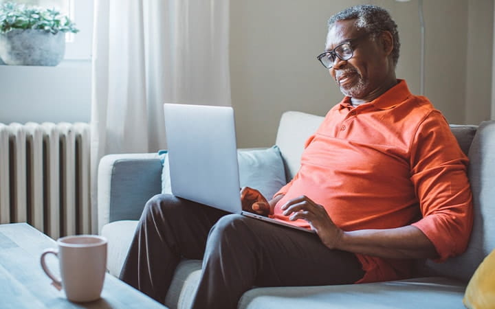 Senior man using a computer
