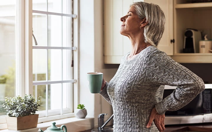 Older woman enjoying morning coffee