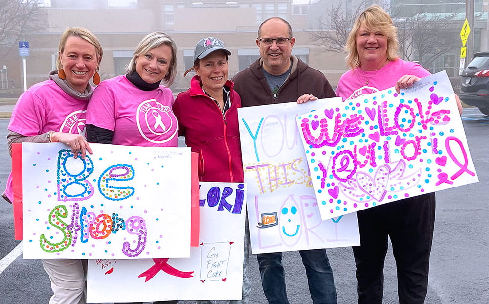 Lori surrounded by her supportive family and friends
