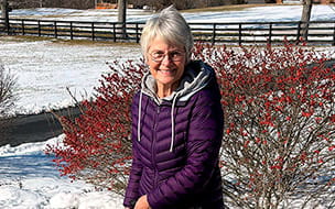 Rosie Miklavcic, RN, MPH outside on a wintry day