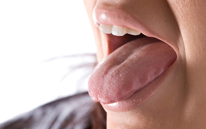 Woman sticking her tongue out
