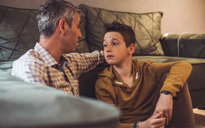 A father and son having a serious discussion