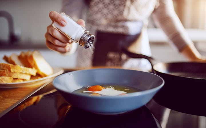 Adding salt to fried eggs