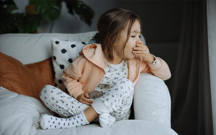 young child coughing