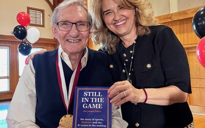 Patient Don Ray poses with Betul Hatipoglu, MD