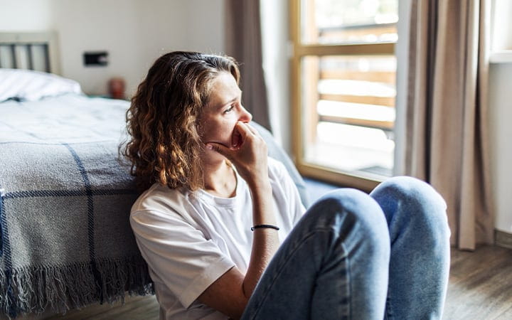 Upset woman thinking