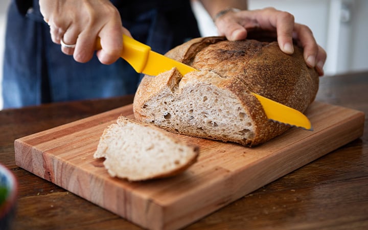Slicing sourdough bread