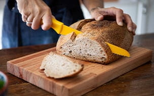Slicing sourdough bread