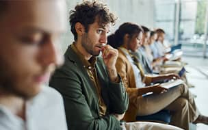 Anxious young man awaits job interview