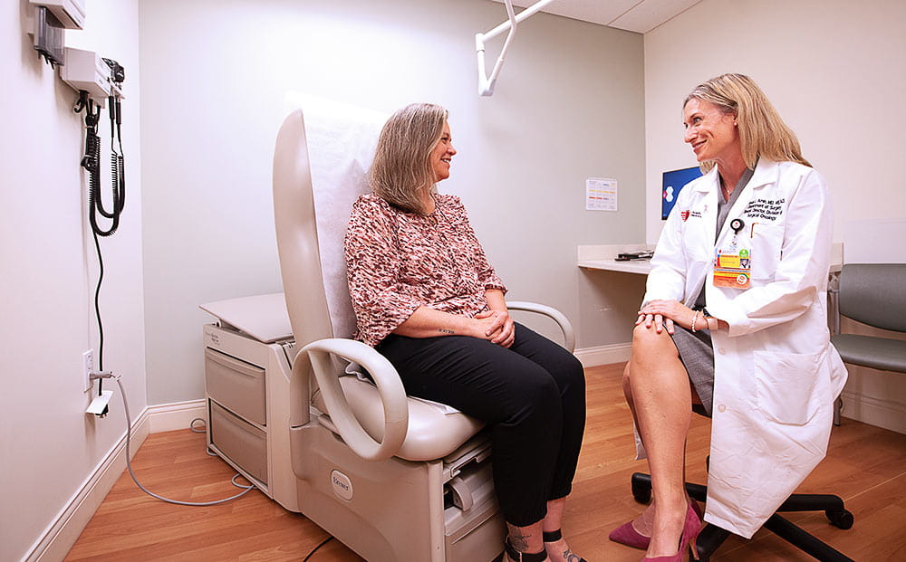 Amanda Amin, MD consults a cancer patient