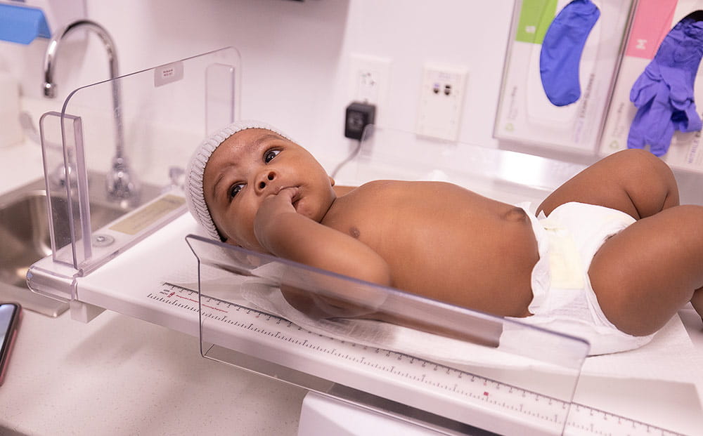 An infant receives care at UH Rainbow Ahuja Center for Women & Children