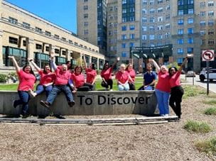 Clinical trials team in front of UHCMC
