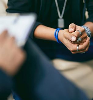 Doctor talking with male patient