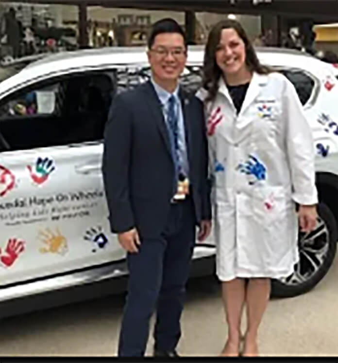 Alex Huang, MD and Kristin VanHeyst DO at Hyundai event at Rainobw