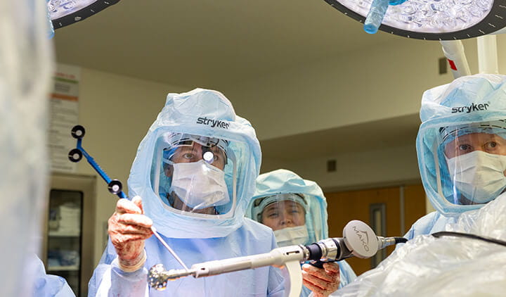 Breana Siljander, MD in surgical suite during procedure