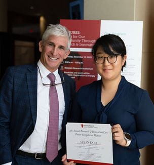 Dan Simon, MD and Susan Doh, MD during UH Research Innovation Day 2023