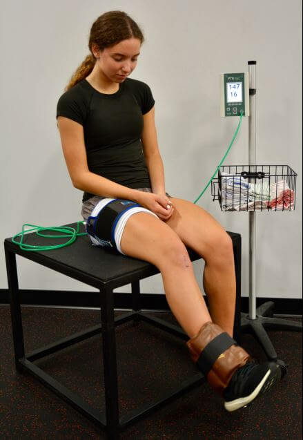 Patient using blood flow therapy