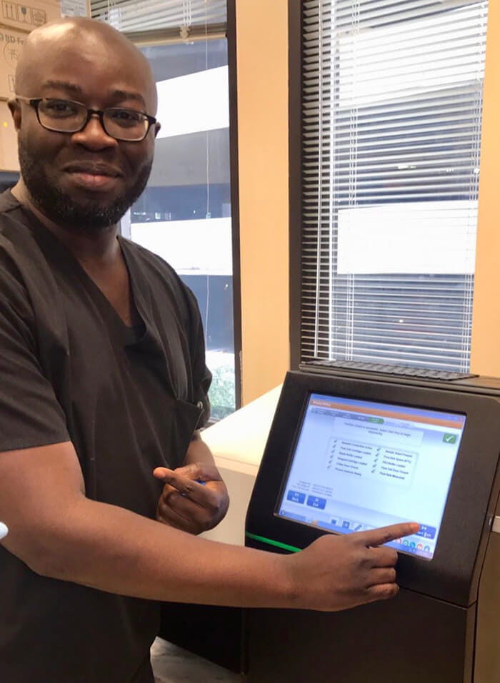 George Yendewa, MD Infectious Disease and Travel Medicine performing HIV drug resistance genotyping on samples from Sierra Leone